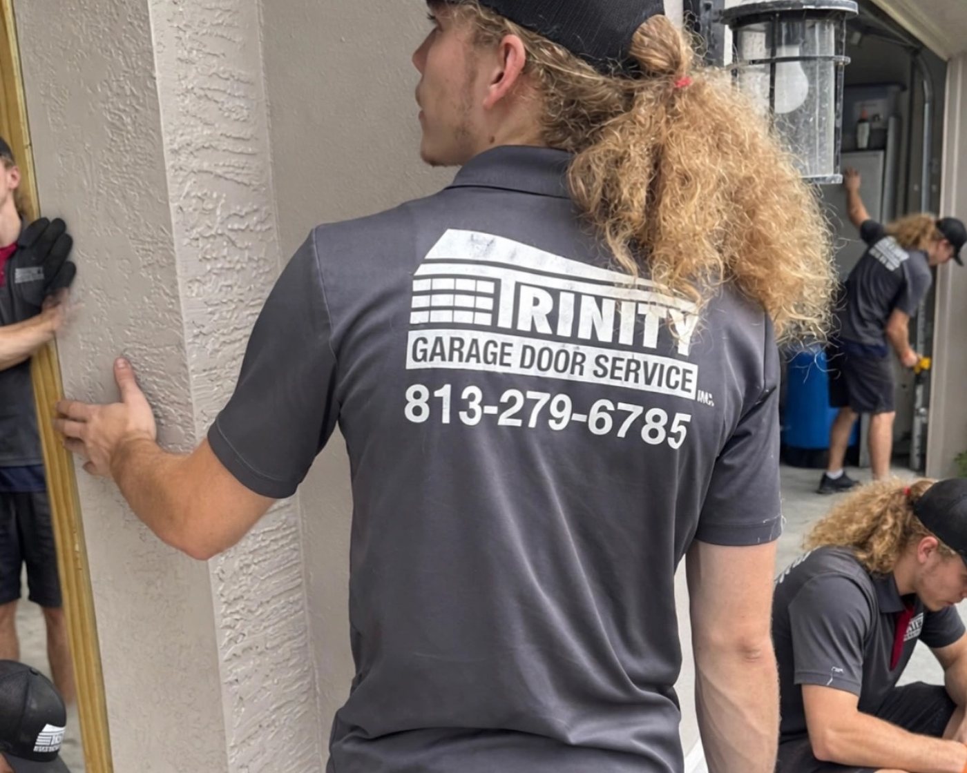 Trinity crew on site, phone number on the back of the polo