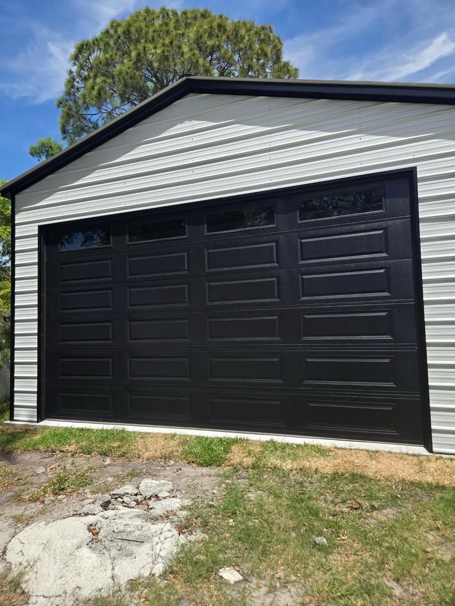 Black garage doors on a Florida home